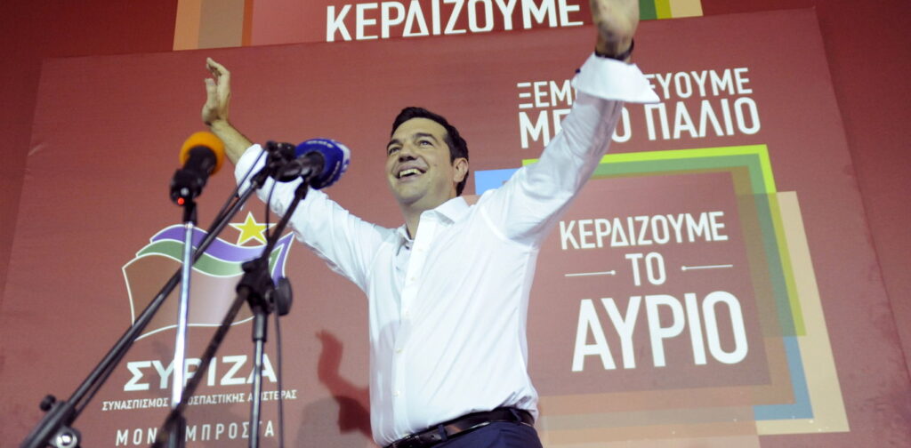  Greek prime minister and leader of leftist Syriza party Alexis Tsipras waves to supporters after winning the general election in Athens